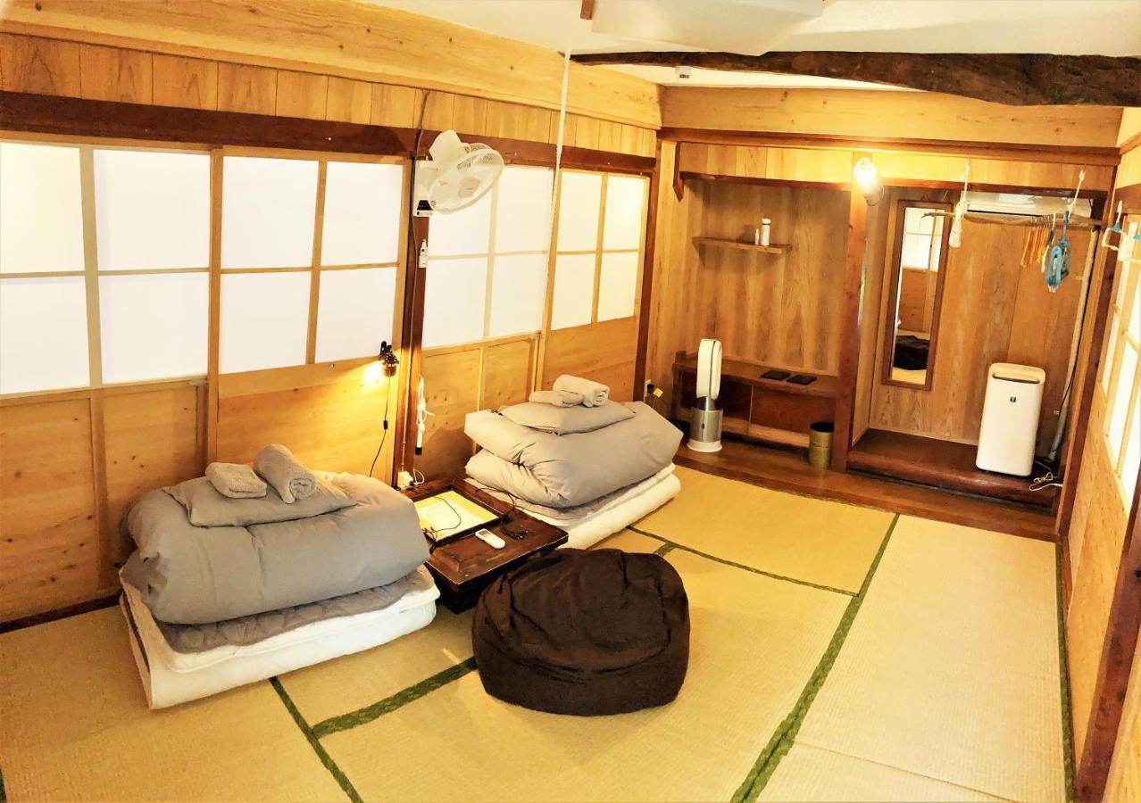 奄美ゲストハウス Hub A Nice Inn Setouchi  Екстериор снимка