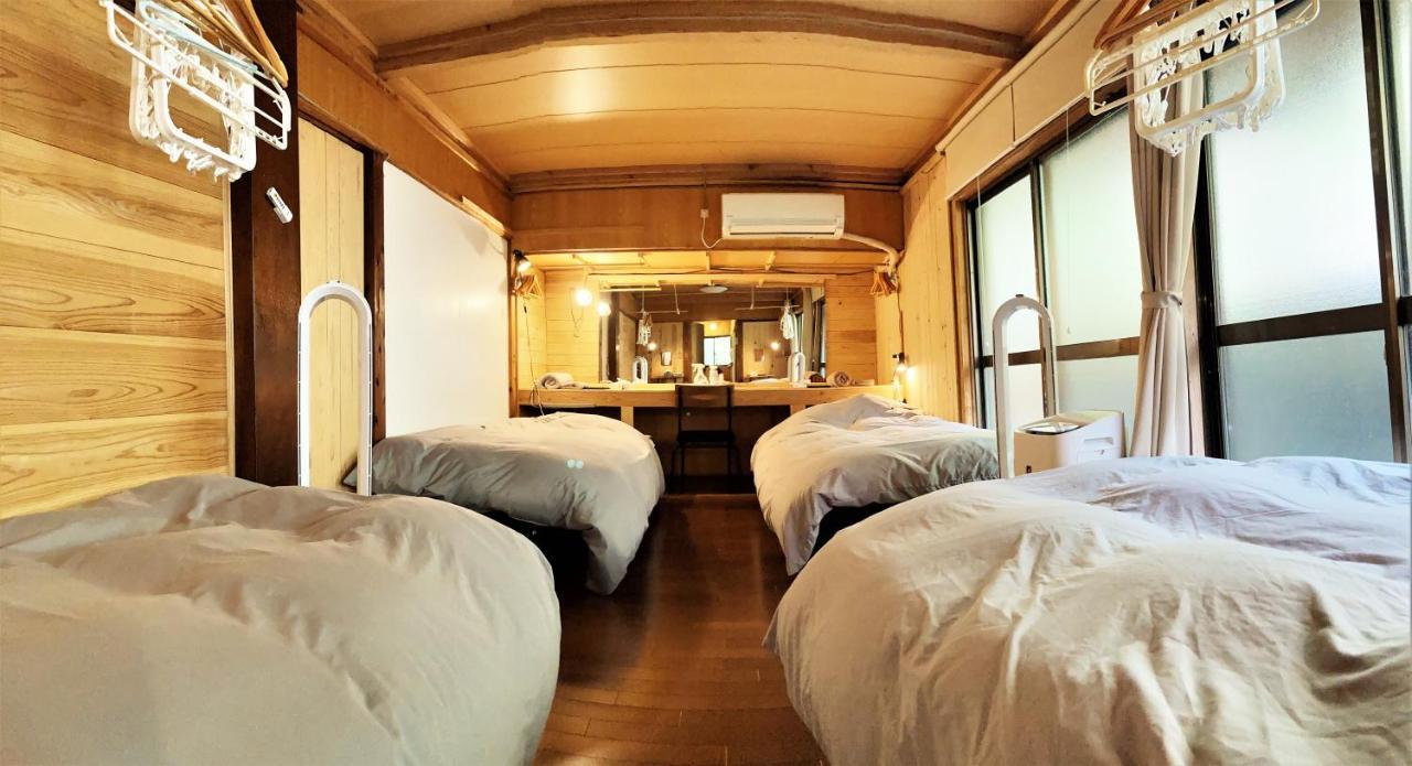 奄美ゲストハウス Hub A Nice Inn Setouchi  Екстериор снимка