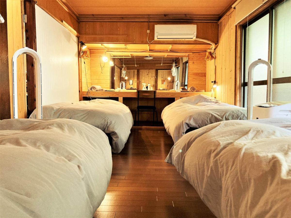 奄美ゲストハウス Hub A Nice Inn Setouchi  Екстериор снимка