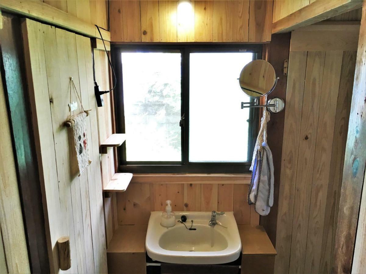 奄美ゲストハウス Hub A Nice Inn Setouchi  Екстериор снимка