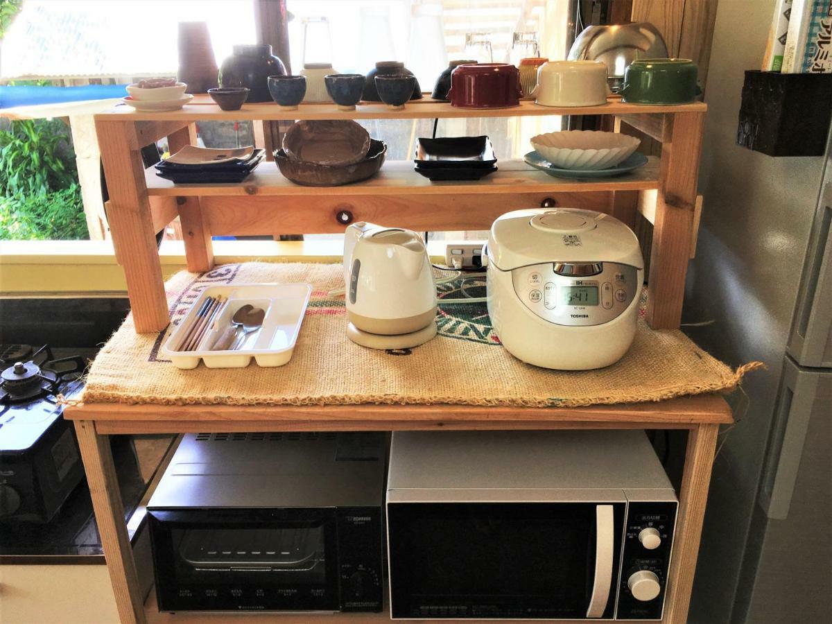 奄美ゲストハウス Hub A Nice Inn Setouchi  Екстериор снимка